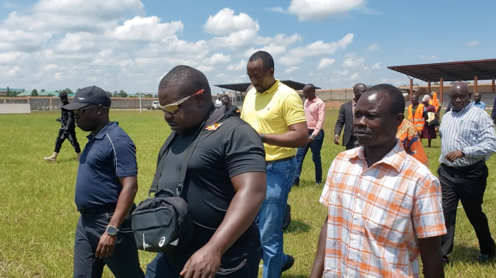 Minister Peter Ogwang and other officials inspect the Terego Sports Complex